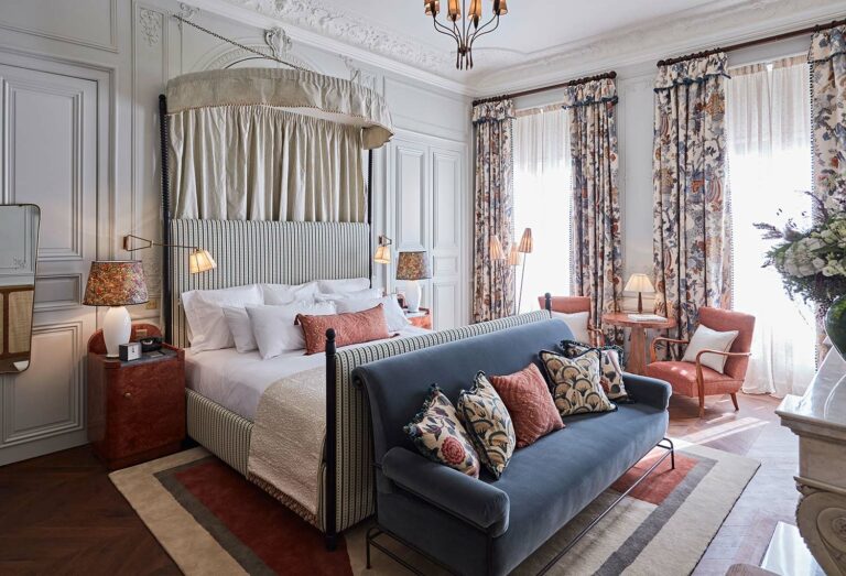One of Soho House's 36 guest rooms with canopy bed and luxurious details